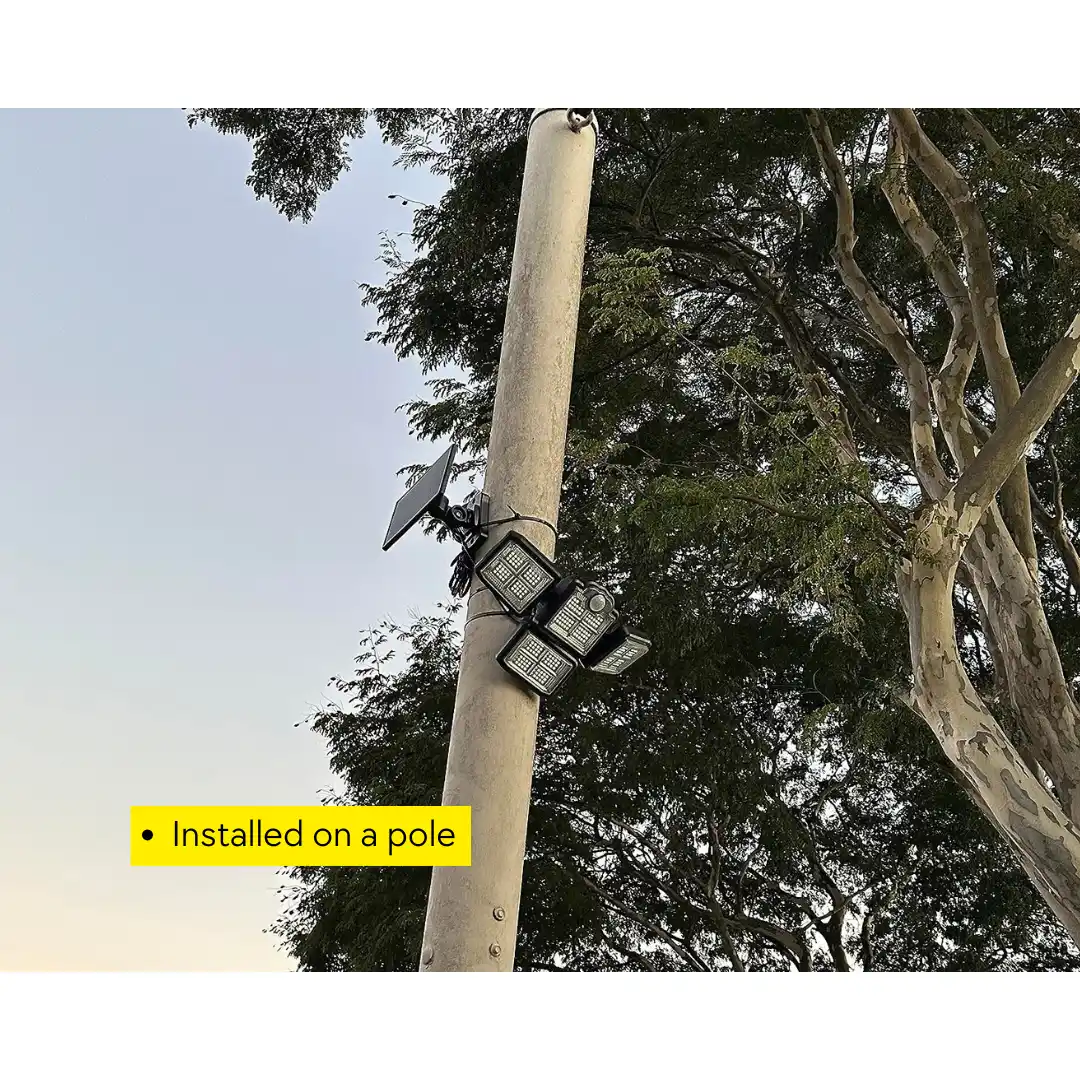 500watts-4-Heads-Solar-sensor-light-installed-on-a-pole.webp